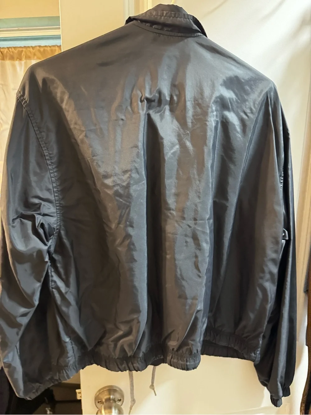 Nike Gray Lightweight Coach Jacket with Red Swoosh Tag